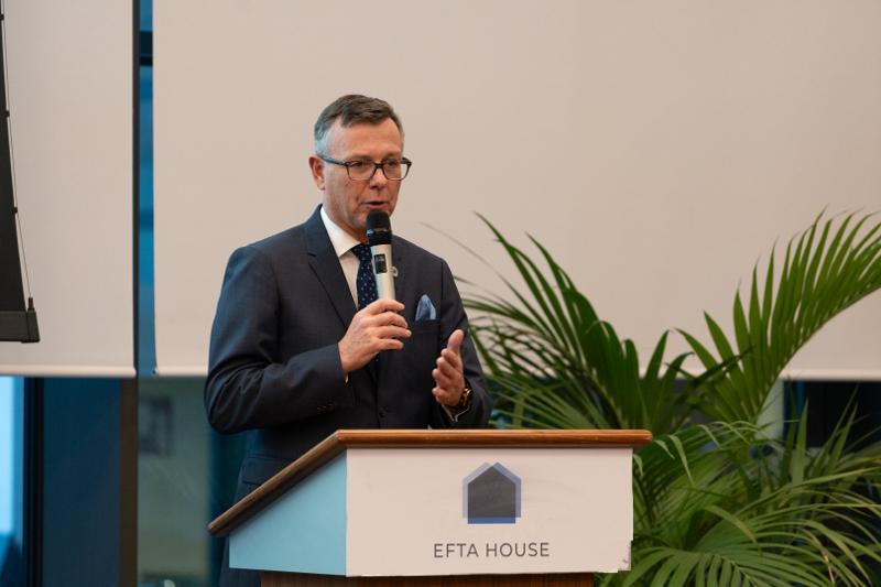 a men speaking at an evetn